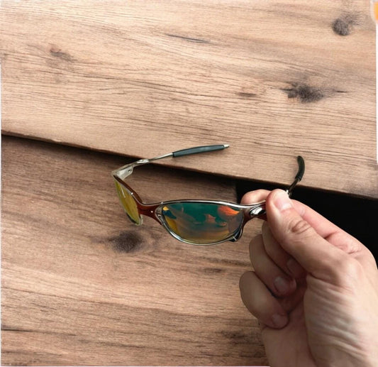 Insane metal frame sunglasses in silver with orange lense. One size.