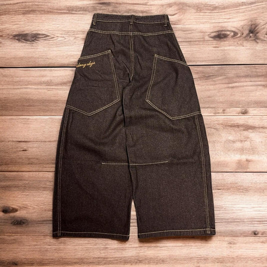 Incredible vintage style baggy wide leg skater fit jeans with embroidery in mid black.