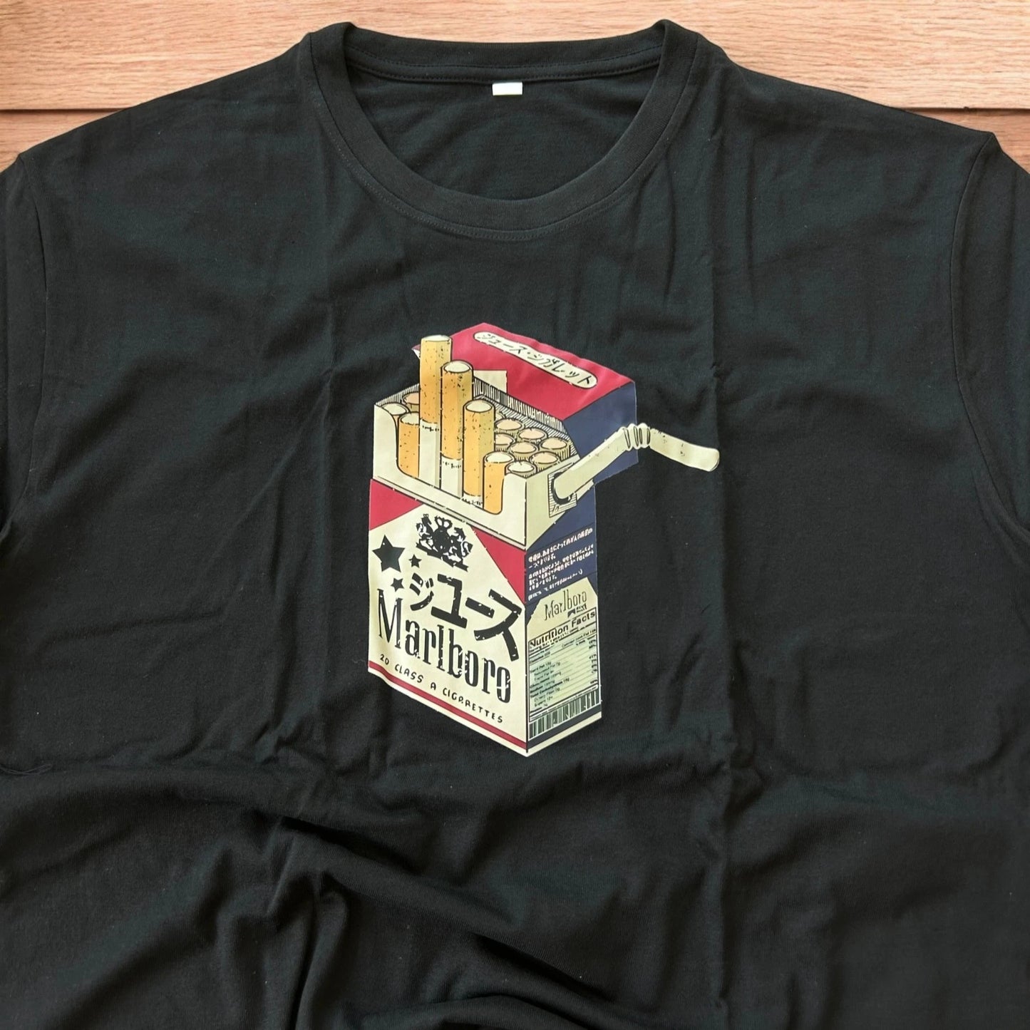 Novelty cigarettes tshirt with front graphic print in black.