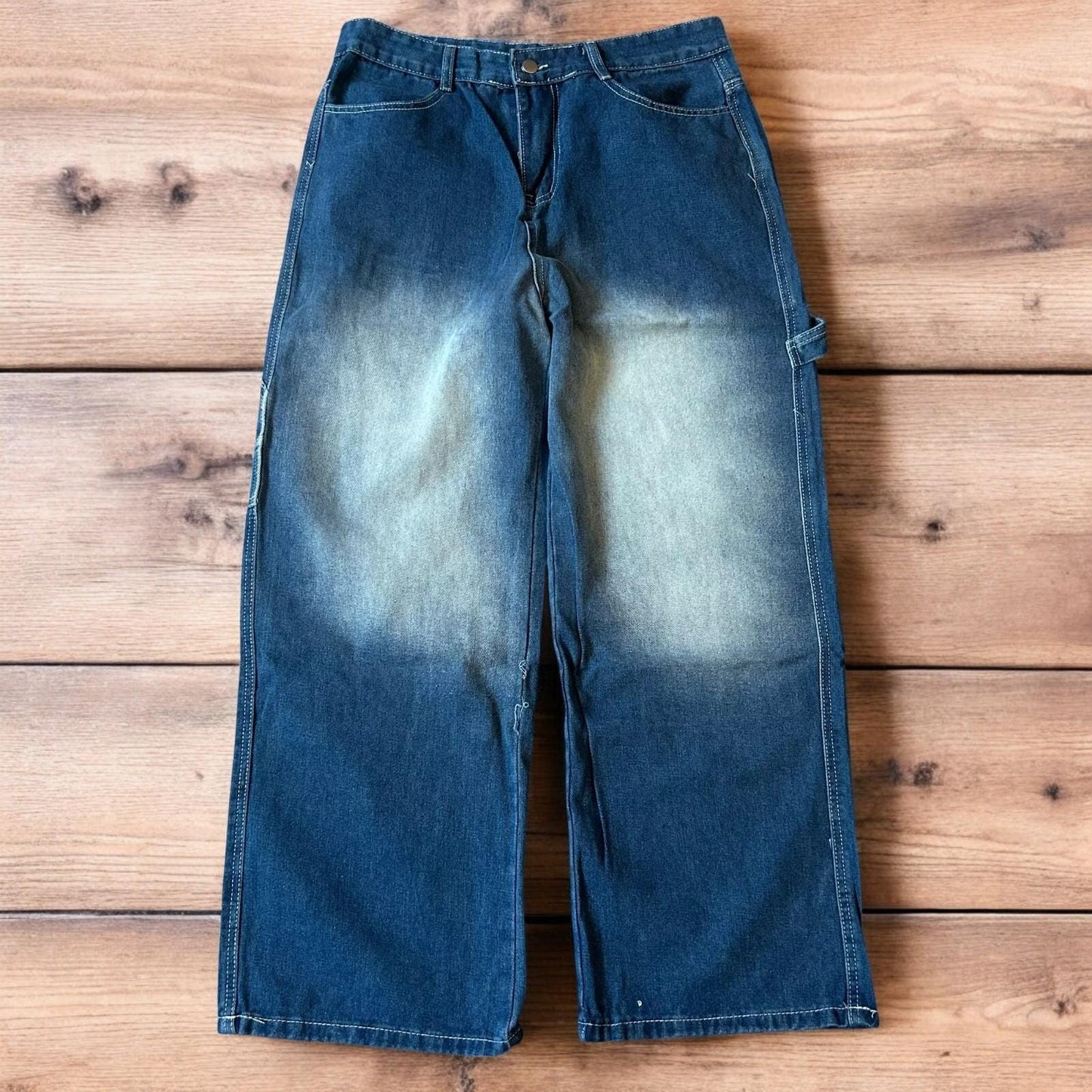 Insane baggy relaxed fit washed blue jeans with red embroidery.