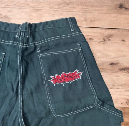 Insane super baggy long skater jean shorts jorts in black with embroidered design.