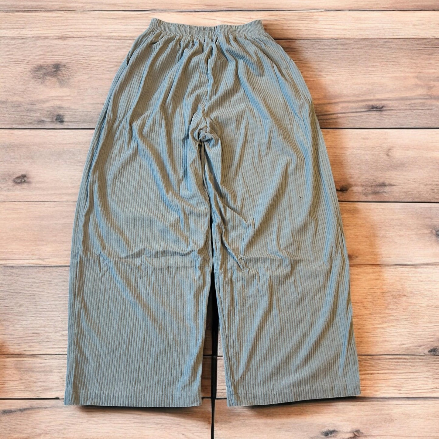 Super baggy wide leg relaxed fit corduroy trousers joggers in light blue.