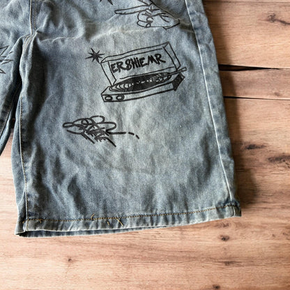 Incredible baggy wide leg denim shorts jorts with graffiti/graphic in light blue.