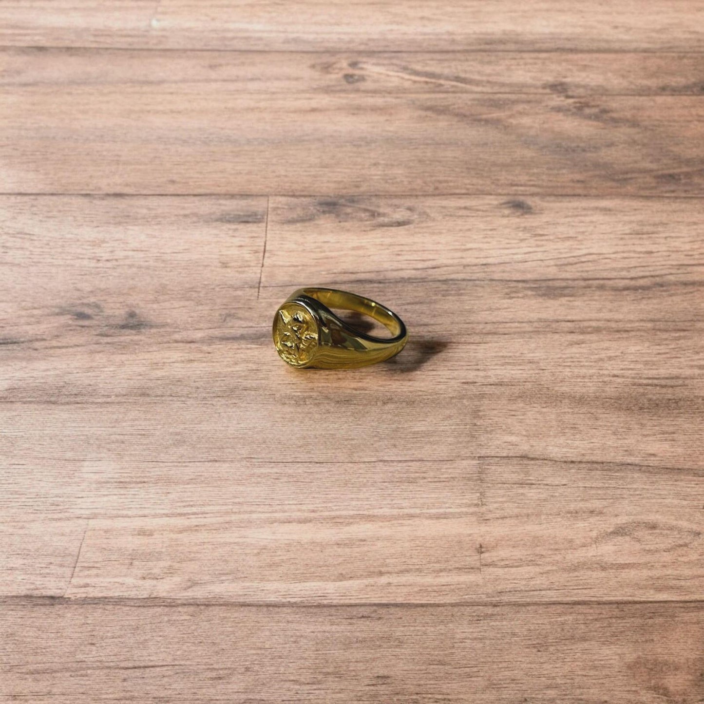 Lovely vintage style stainless steel angel signet ring in gold.