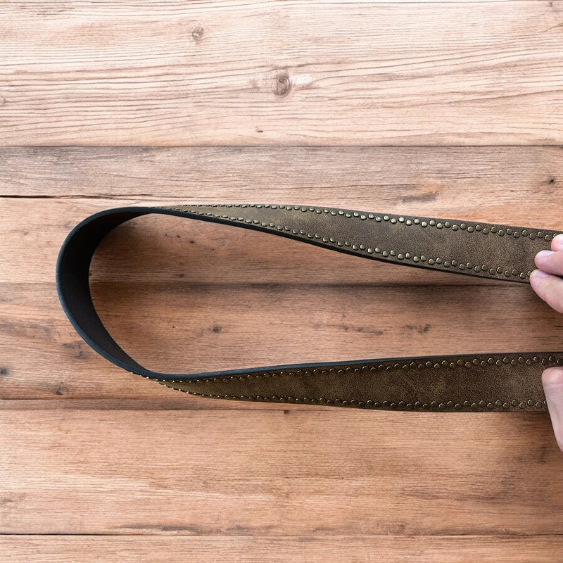 Vintage style faux leather western cowboy gothic belt in brown with brass trim.