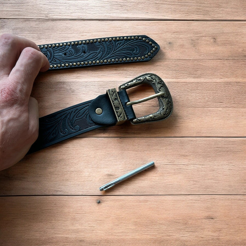 Vintage style faux leather western cowboy gothic belt in black with brass trim.
