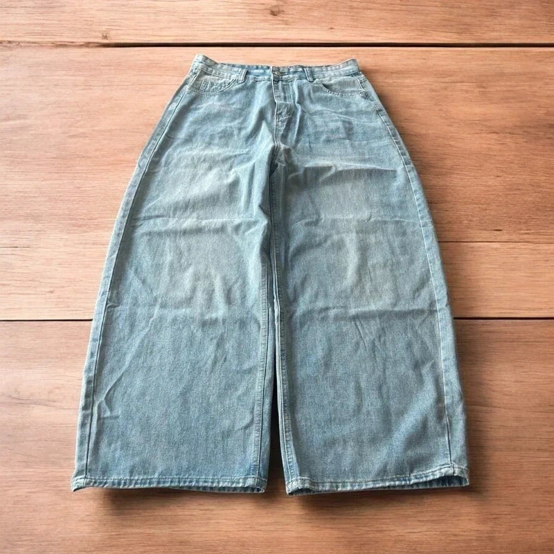 Vintage style baggy wide leg skater fit jeans in light blue.