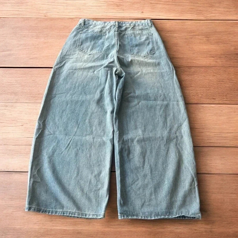 Vintage style baggy wide leg skater fit jeans in light blue.