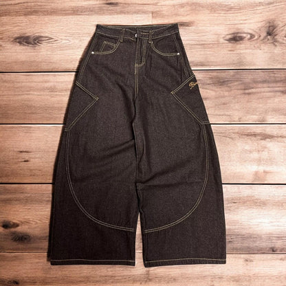 Incredible vintage style baggy wide leg skater fit jeans with embroidery in mid black.