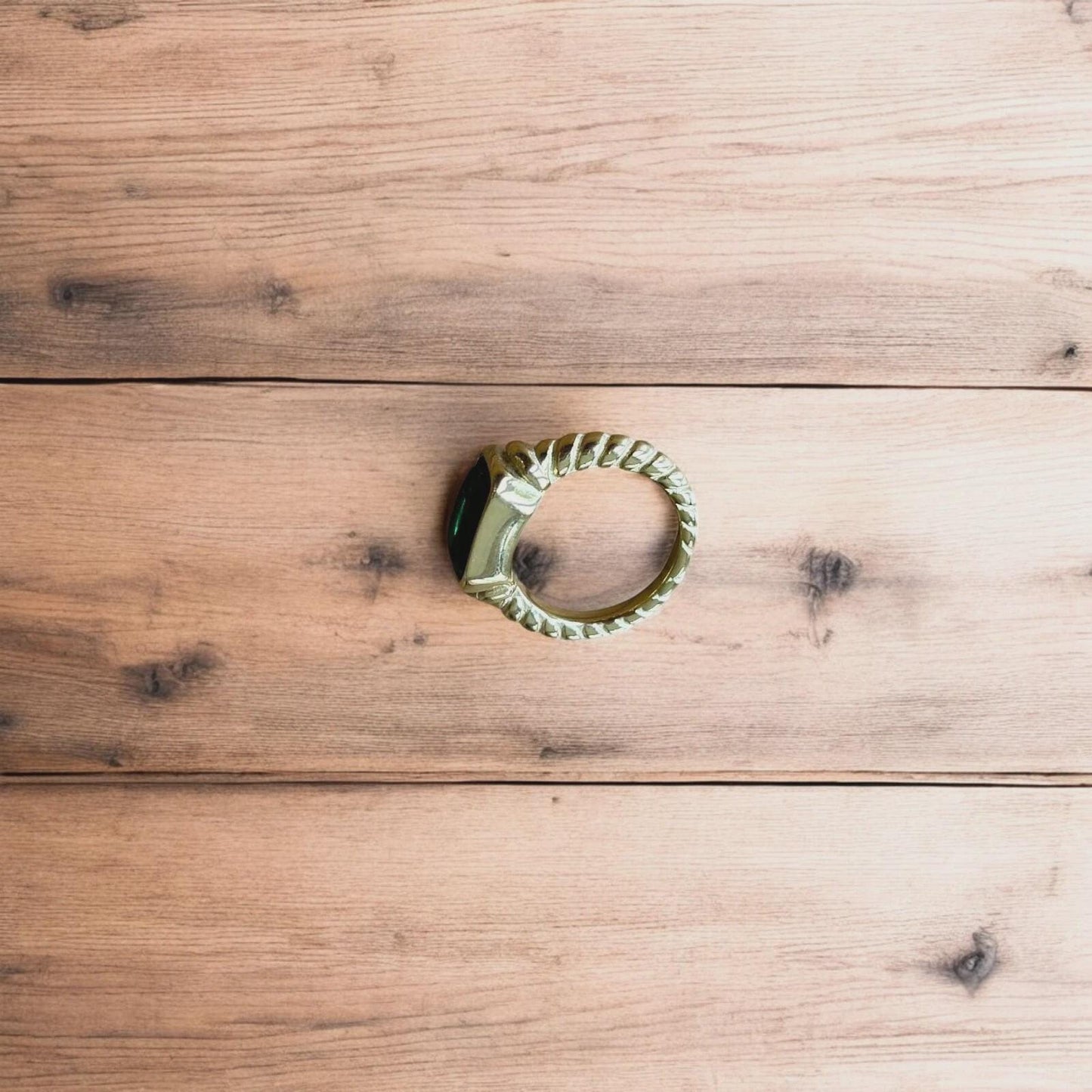 Lovely vintage style gold ring with green gemstone.