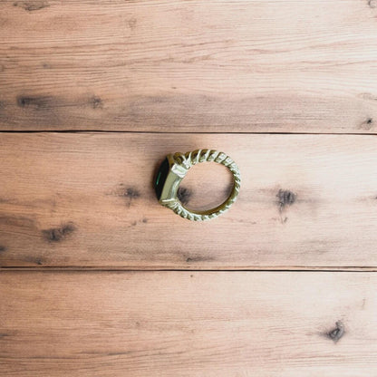 Lovely vintage style gold ring with green gemstone.