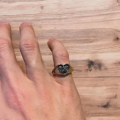 Lovely vintage style stainless steel cupid angel heart signet ring in silver.
