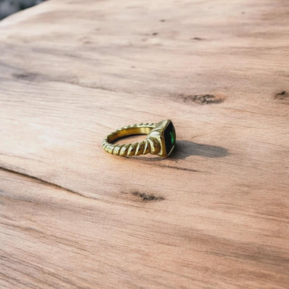 Lovely vintage style gold ring with green gemstone.