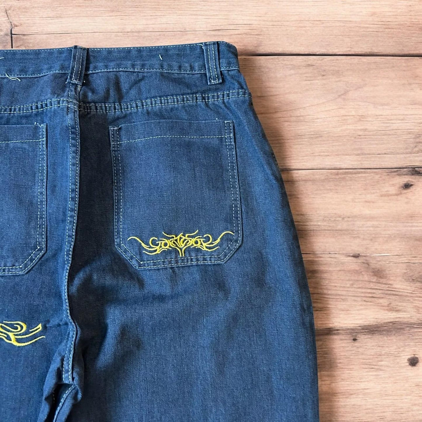 Insane baggy relaxed fit jeans in washed dark blue with embroidery.