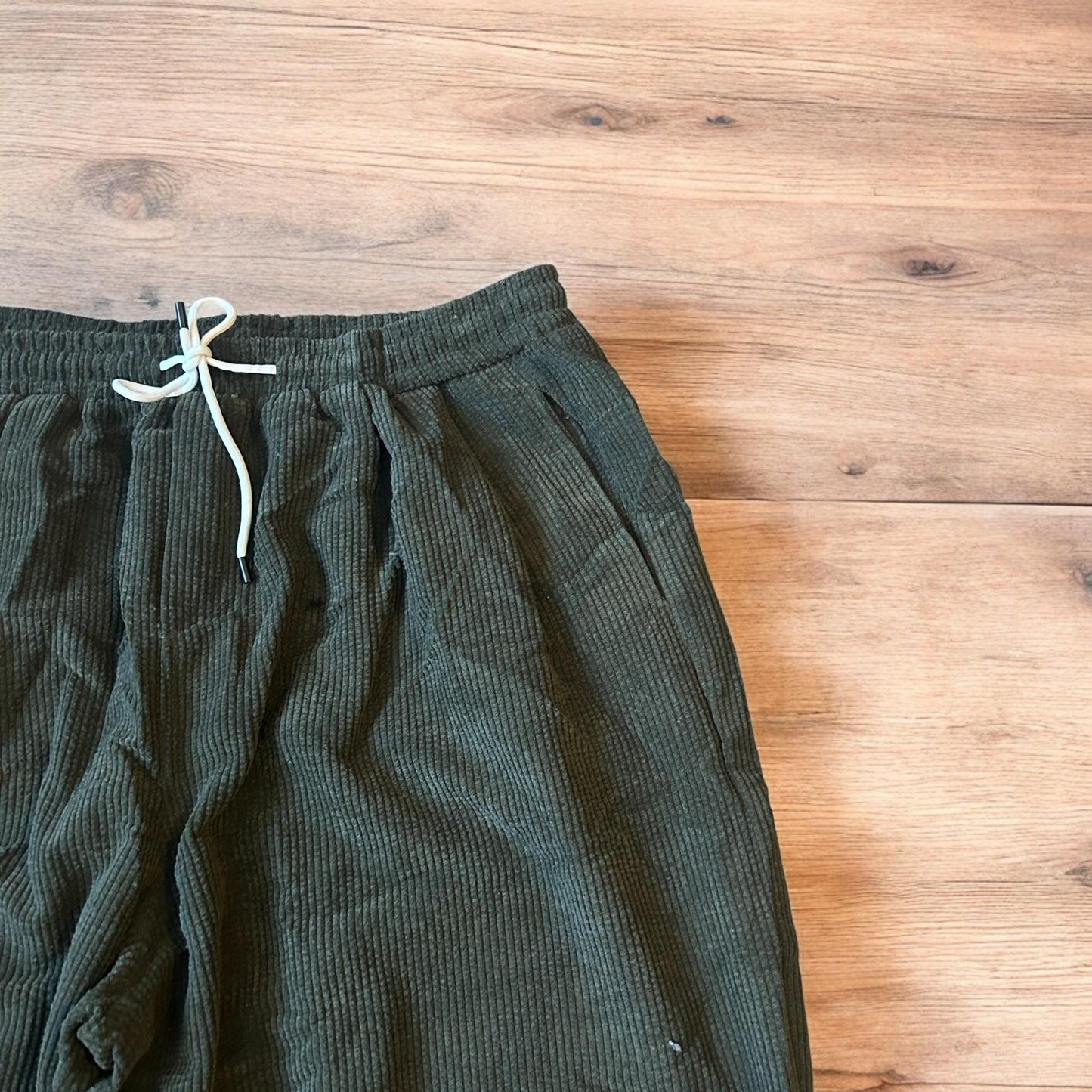 Super baggy wide leg skater corduroy trousers in khaki green.