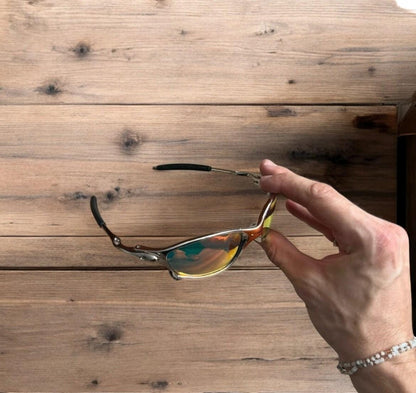 Insane metal frame sunglasses in silver with orange lense. One size.
