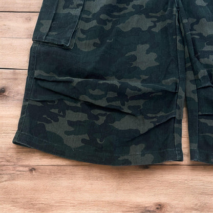 Super baggy wide leg cargo carpenter shorts jorts in army camo.