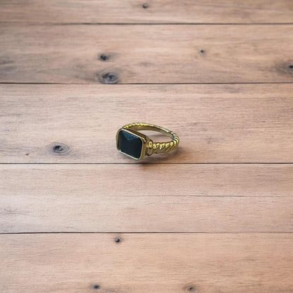 Lovely vintage style gold ring with black gemstone.