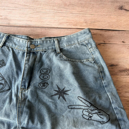 Incredible baggy wide leg denim shorts jorts with graffiti/graphic in light blue.