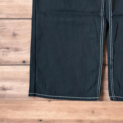 Insane baggy relaxed fit jeans washed black with red embroidery.
