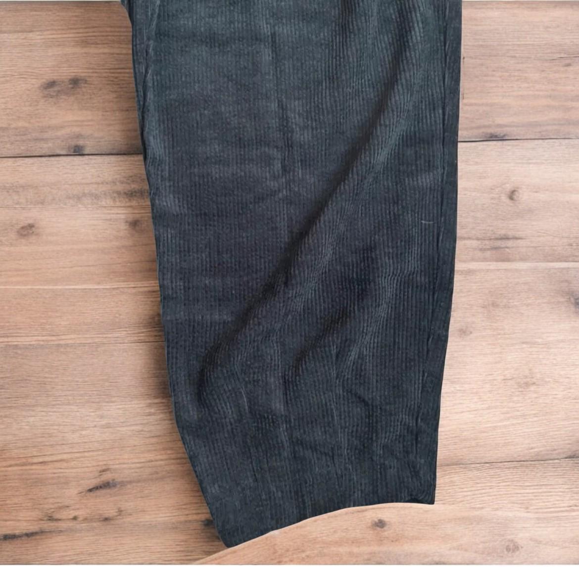 Super baggy wide leg skater corduroy trousers in black.