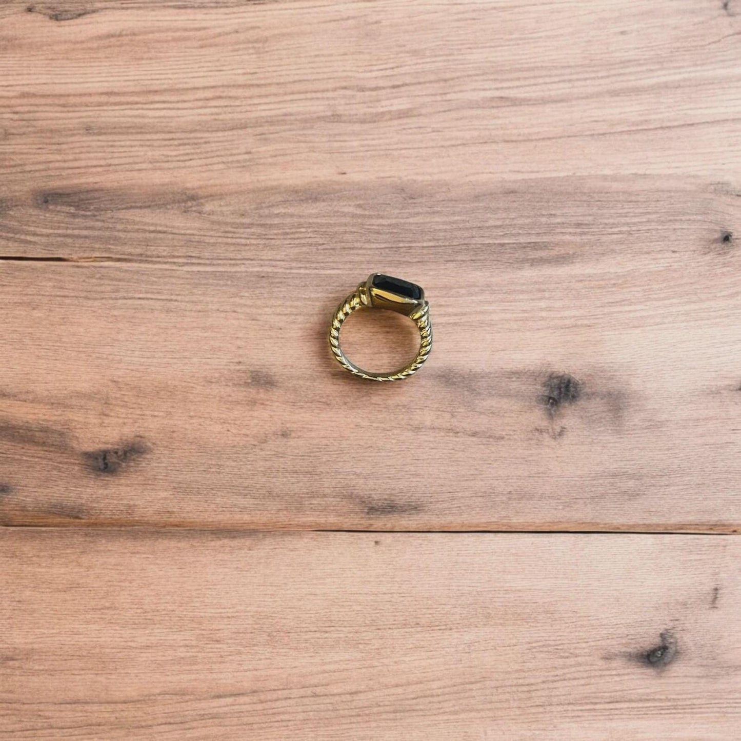 Lovely vintage style gold ring with black gemstone.