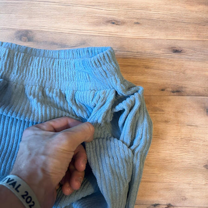 Super baggy wide leg relaxed fit corduroy trousers joggers in light blue.