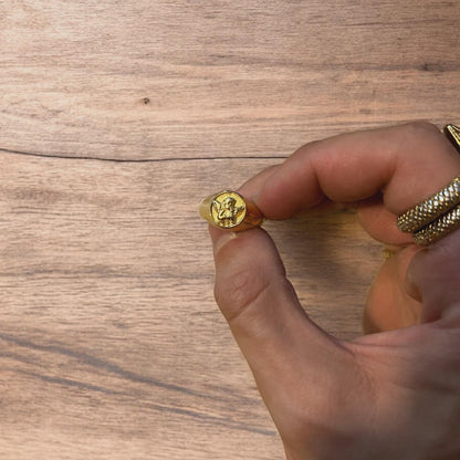 Lovely vintage style stainless steel angel signet ring in gold.