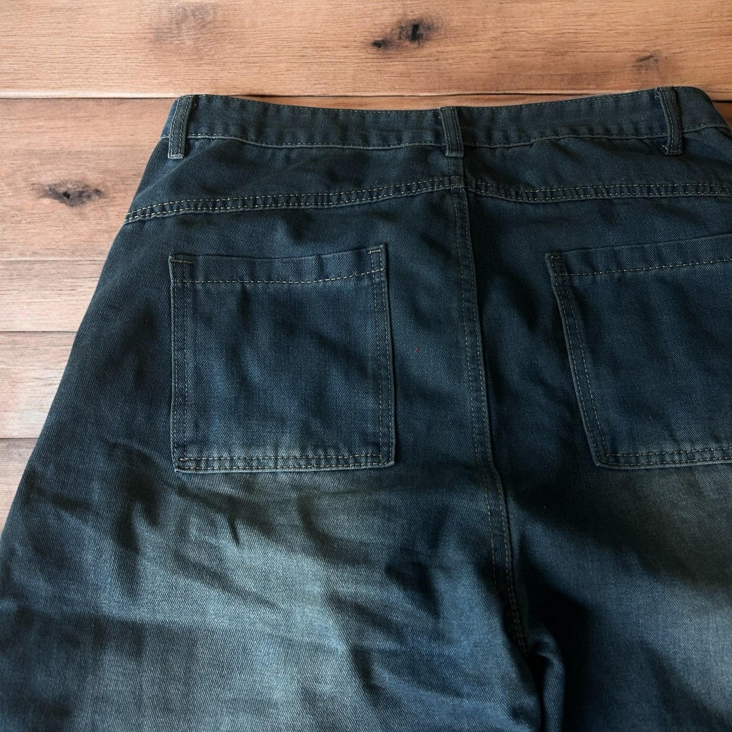 Incredible super baggy wide leg denim carpenter shorts jorts in dark blue wash.