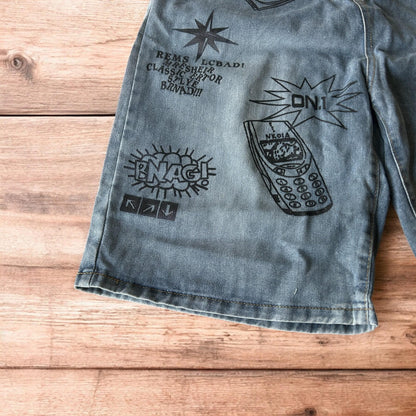 Incredible baggy wide leg denim shorts jorts with graffiti/graphic in light blue.
