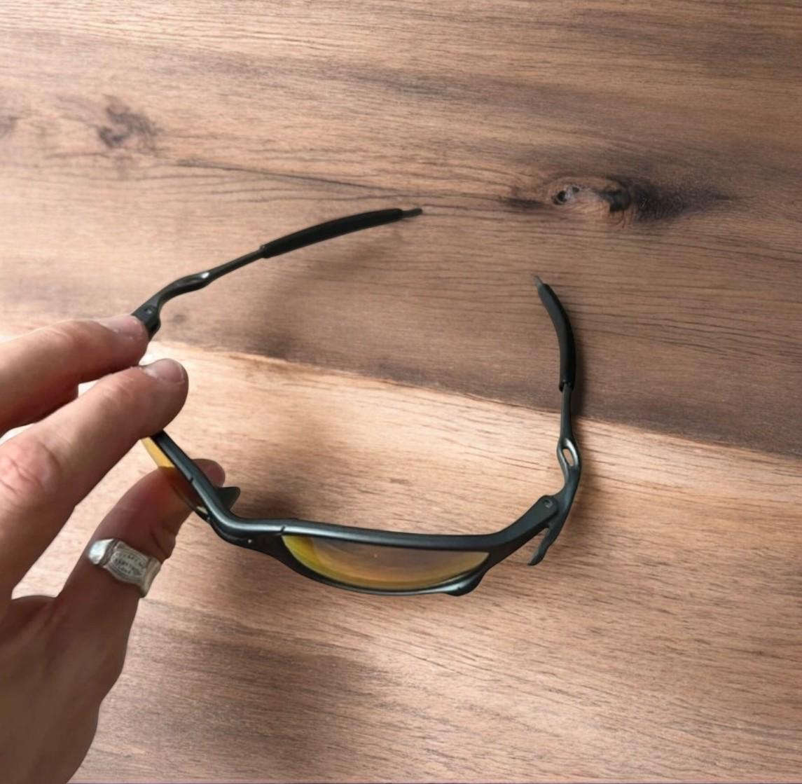 Insane metal frame sunglasses in black with red lense. One size.