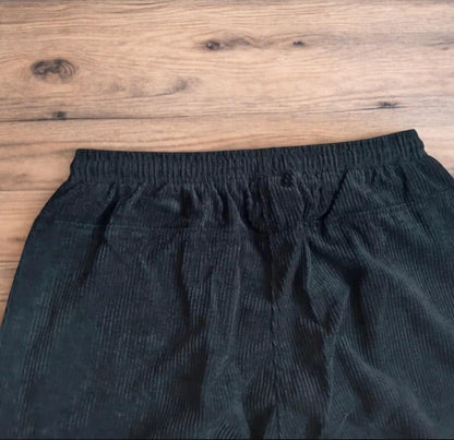 Super baggy wide leg skater corduroy trousers in black.