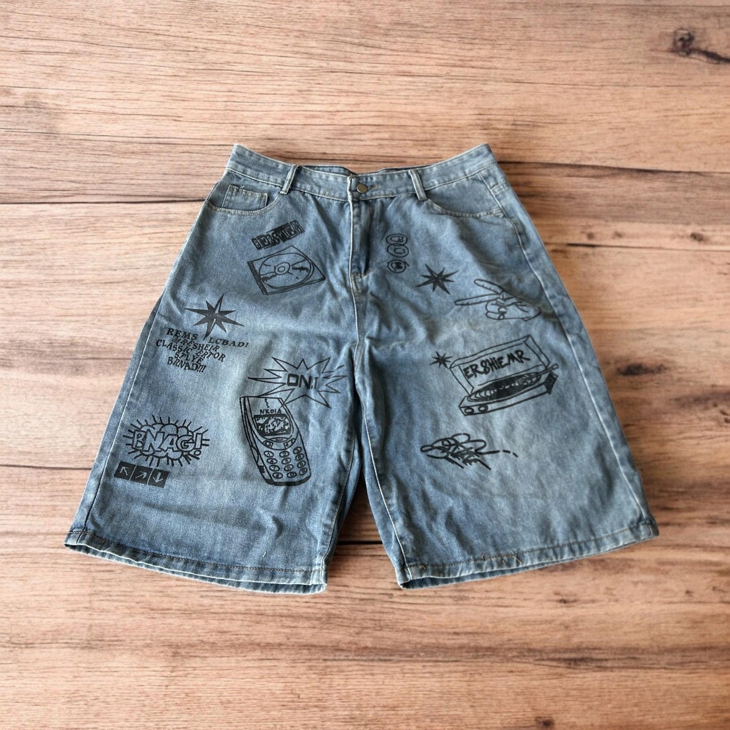 Incredible baggy wide leg denim shorts jorts with graffiti/graphic in light blue.