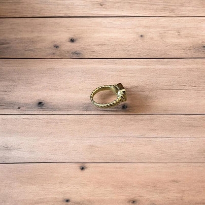 Lovely vintage style gold ring with pink gemstone. All sizes.