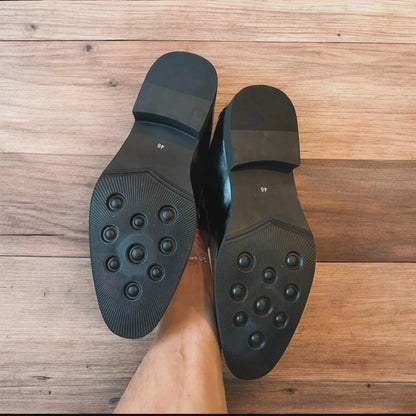 Lovely classic style penny loafers shoes in black and white design.
