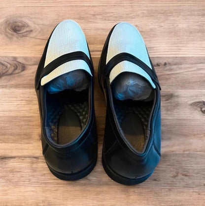Lovely classic style loafers shoes in black and white design.
