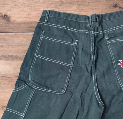 Insane super baggy long skater jean shorts jorts in black with embroidered design.