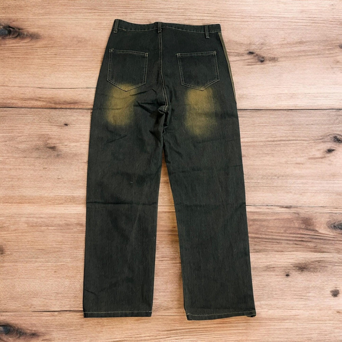 Vintage style relaxed loose skater fit jeans with side stripes in dark blue wash.