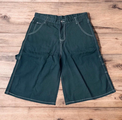 Insane super baggy long skater jean shorts jorts in black with embroidered design.