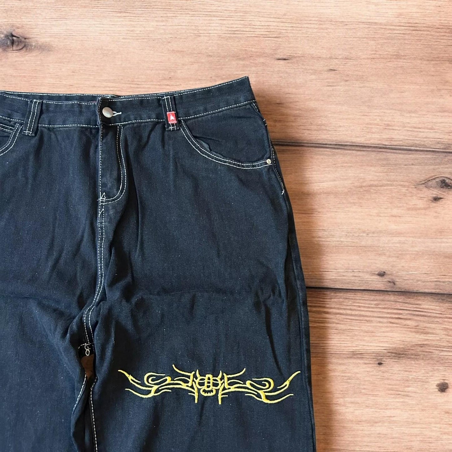 Insane baggy relaxed fit jeans in washed black with embroidery.