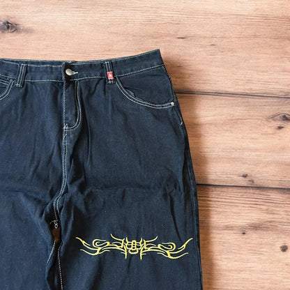 Insane baggy relaxed fit jeans in washed black with embroidery.