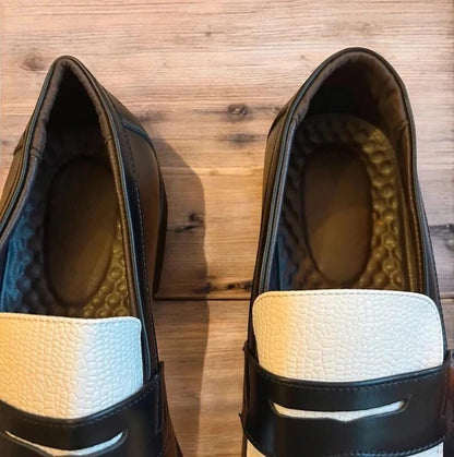 Lovely classic style loafers shoes in black and white design.