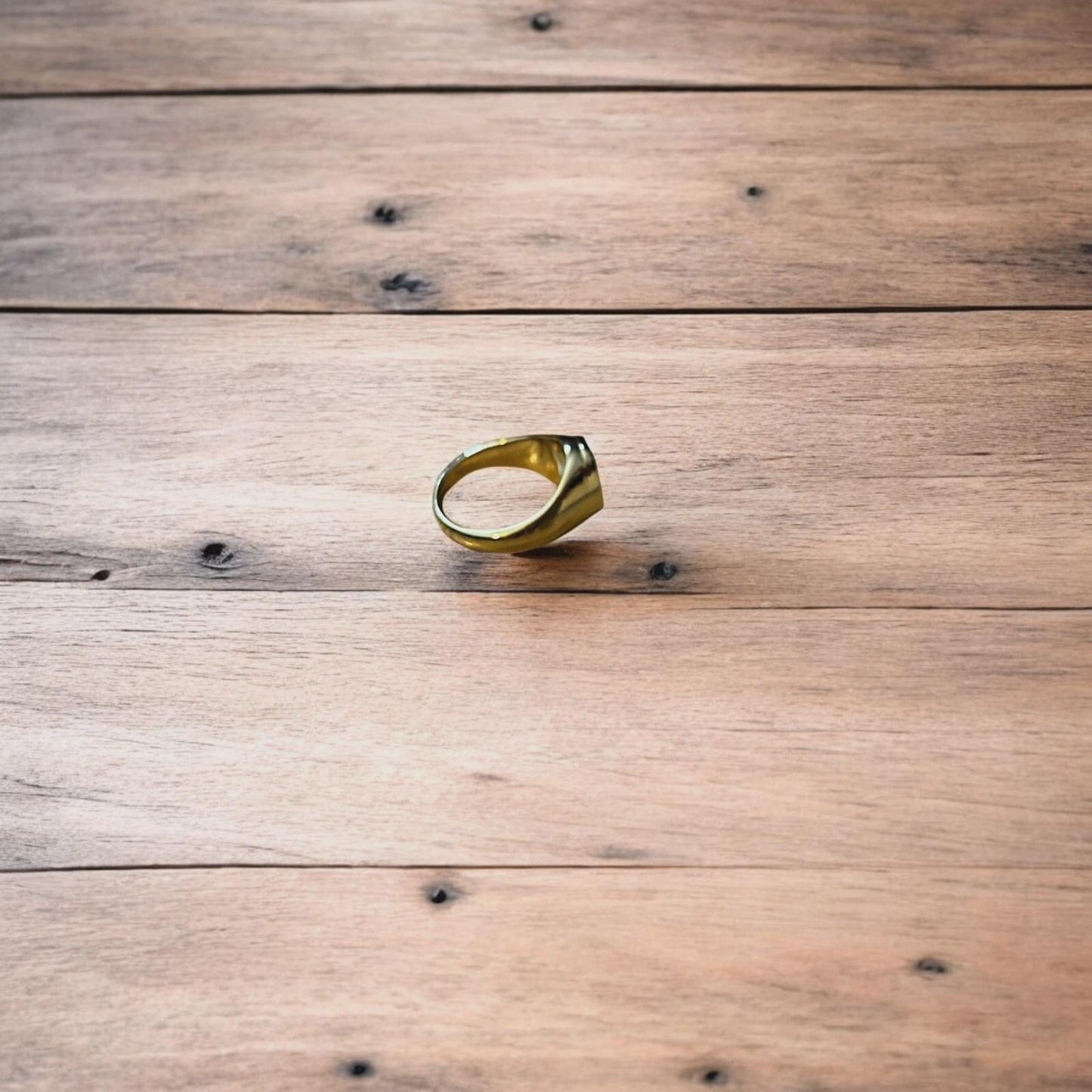 Lovely vintage style stainless steel angel signet ring in gold.
