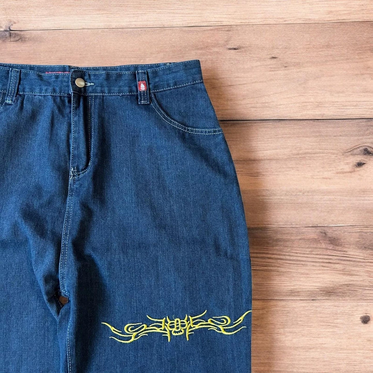 Insane baggy relaxed fit jeans in washed dark blue with embroidery.