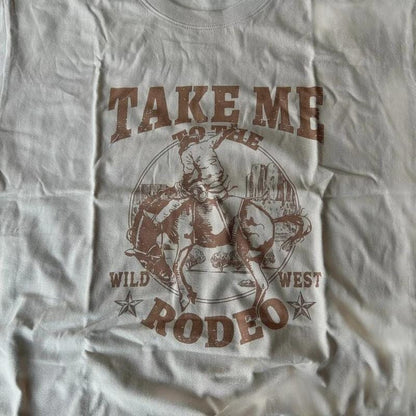 Lovely vintage style cowboy western 'Take Me To The Rodeo' tshirt in brown.