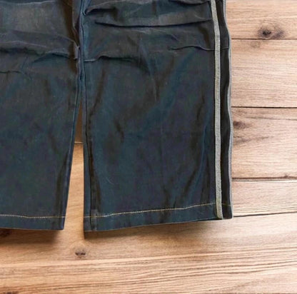 Vintage style baggy wide leg skater fit jeans with side stripes in washed black.