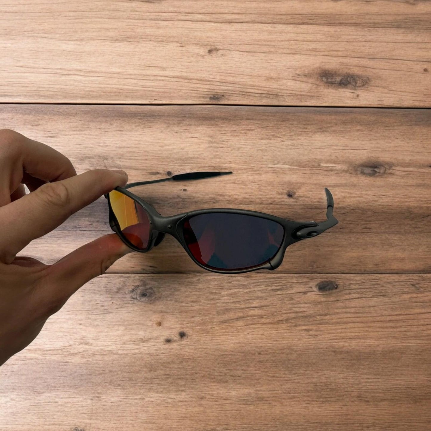 Insane metal frame polarised sunglasses in black frame red lense. One size.