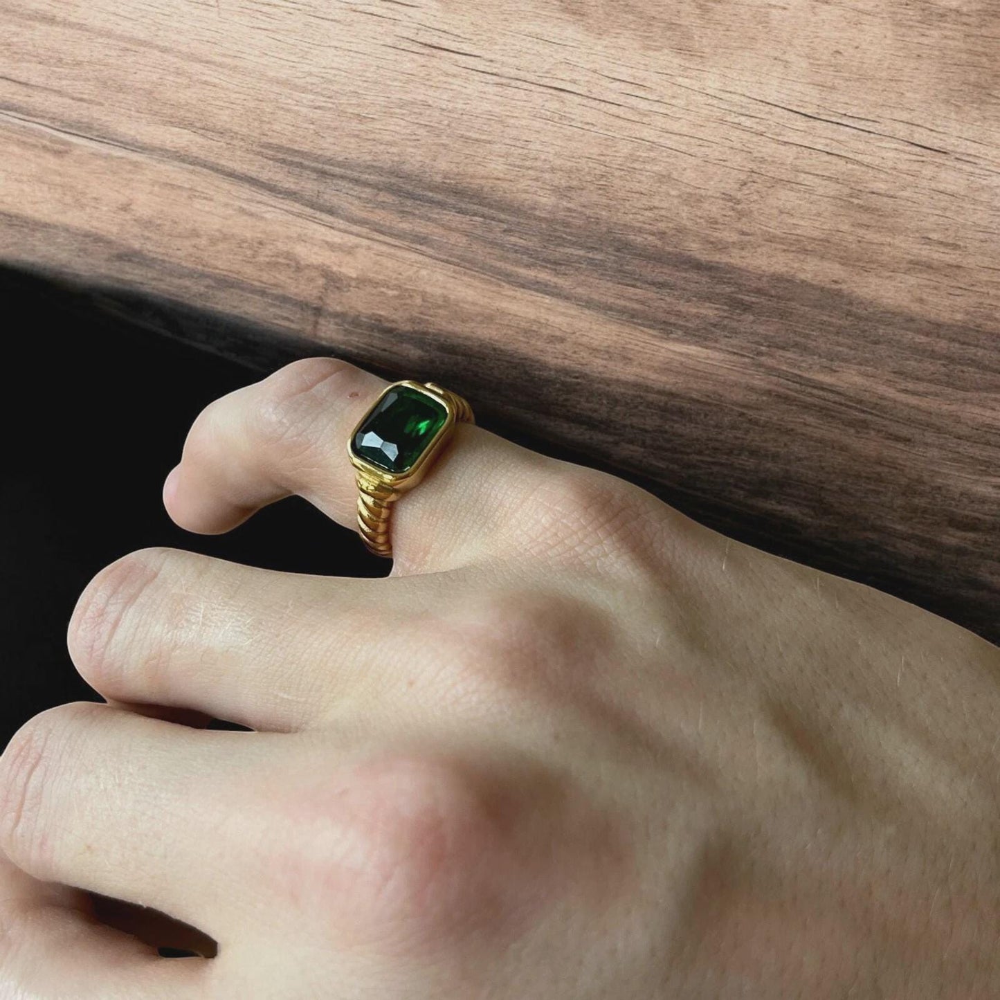 Lovely vintage style gold ring with green gemstone.