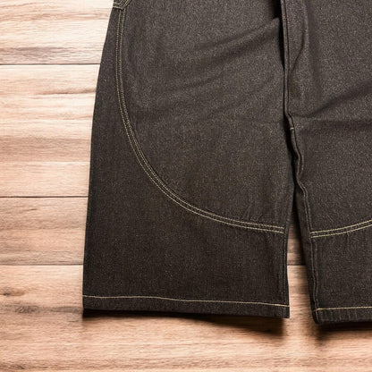 Incredible vintage style baggy wide leg skater fit jeans with embroidery in mid black.