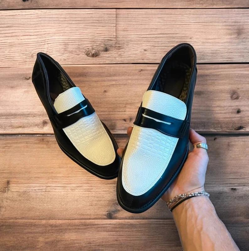 Lovely classic style loafers shoes in black and white design.